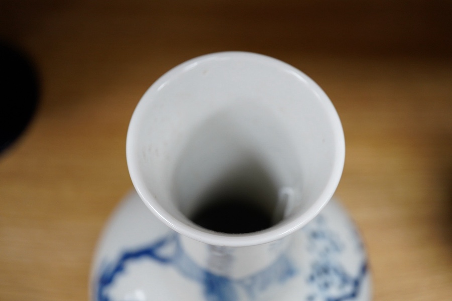 A Chinese blue and white glazed porcelain bottle vase, 27cm high. Condition - good